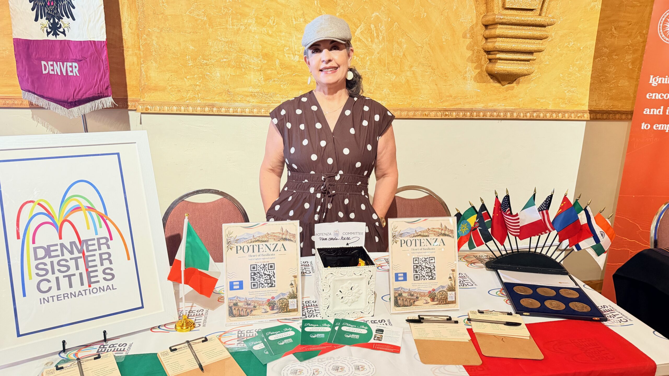 Potenza Sister City Committee volunteer sharing information about DSCI
